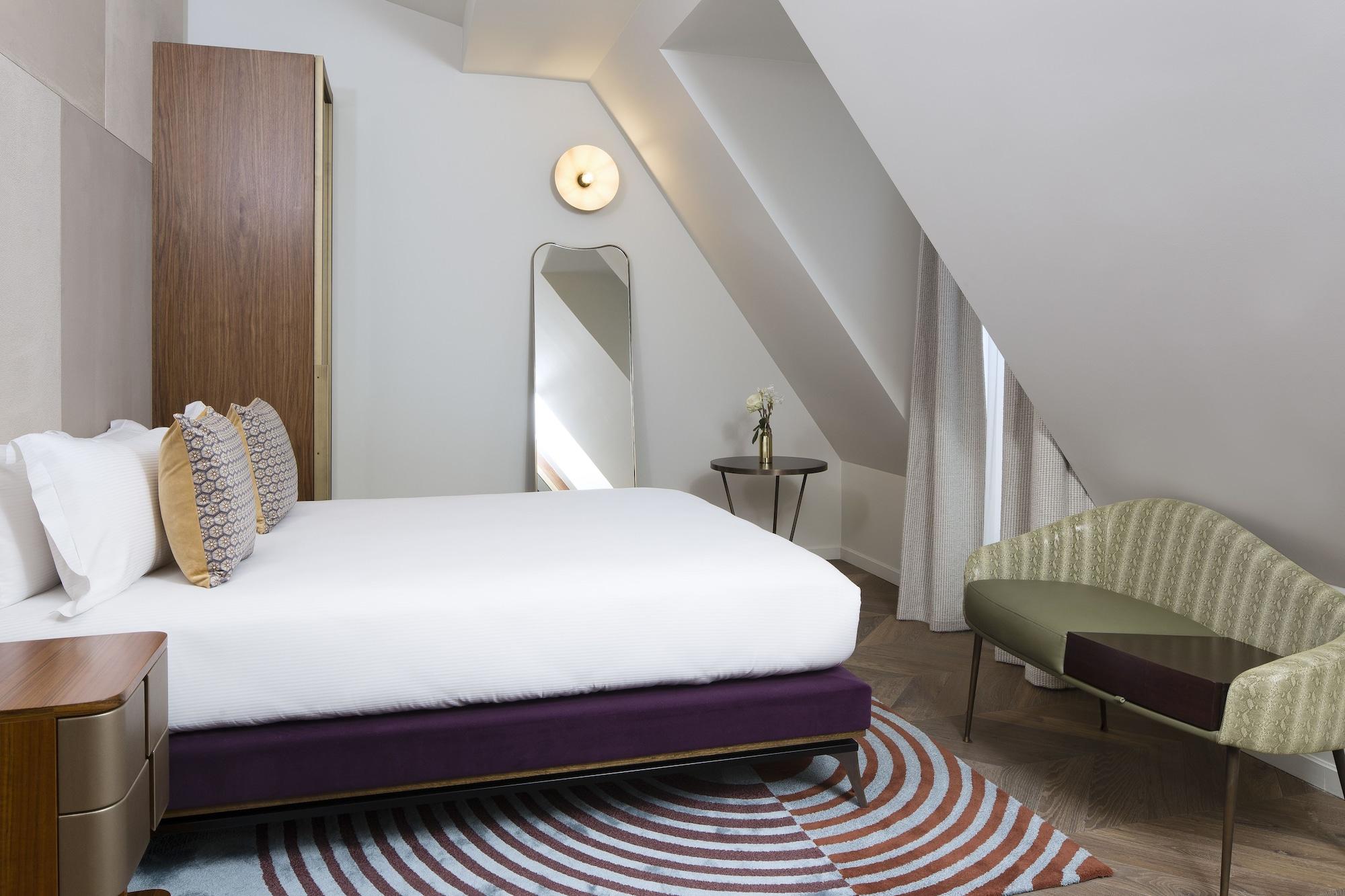 ホテル メゾン ブレゲ パリ エクステリア 写真 A bedroom at the Hotel 57