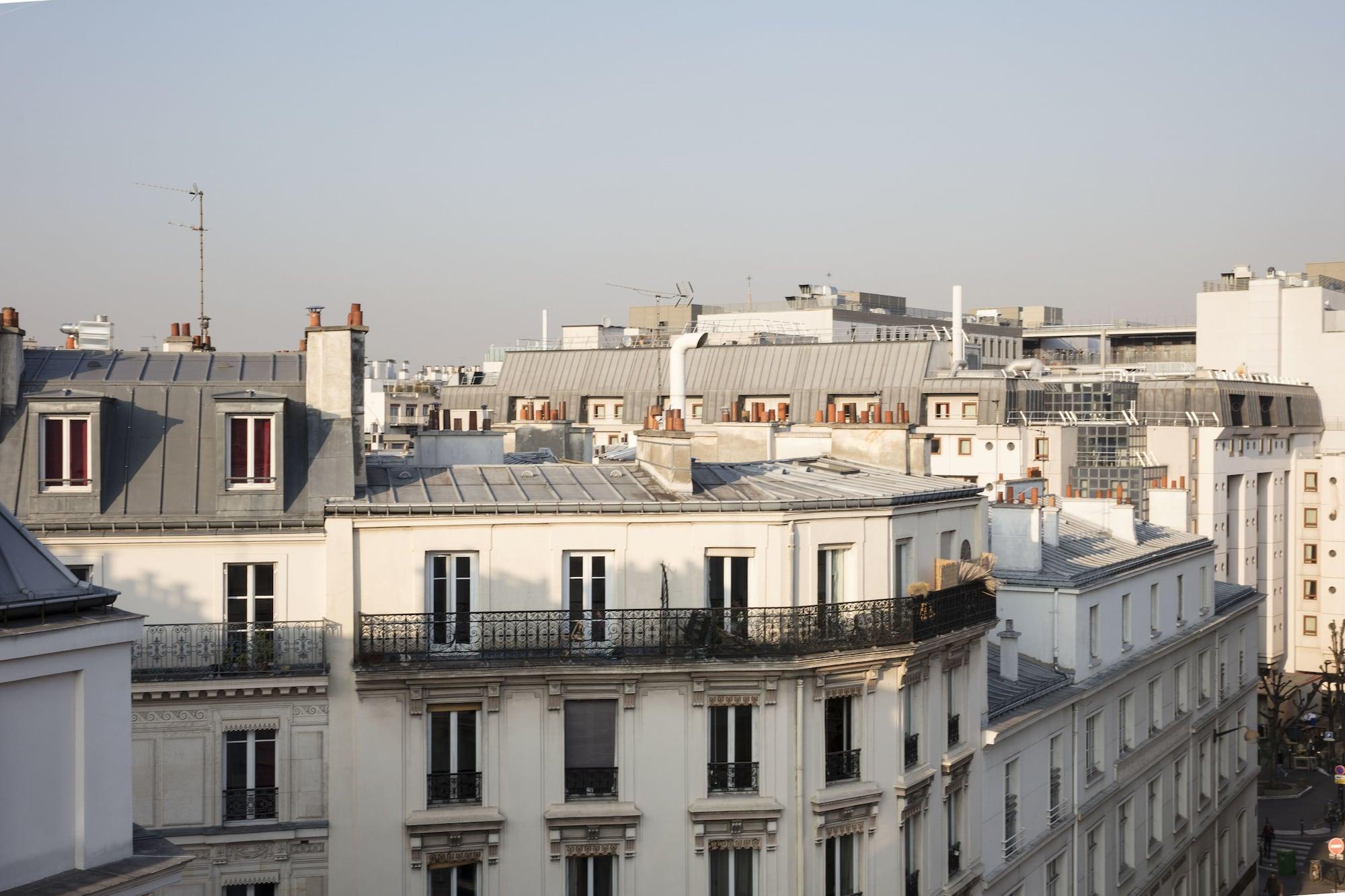 ホテル メゾン ブレゲ パリ エクステリア 写真 Haussmann apartment buildings in Paris